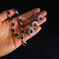 Gem Gardener, red ruby jewellery singapore, unheated ruby ring, ruby jewelry singapore, ruby necklace singapore, ruby earrings singapore, unheated ruby jewelry, ruby necklace singapore, pigeon blood ruby singapore, red ruby necklace and earring set, ruby diamond necklace set, ruby ring singapore, ruby cluster ring white gold, ruby halo diamond ring