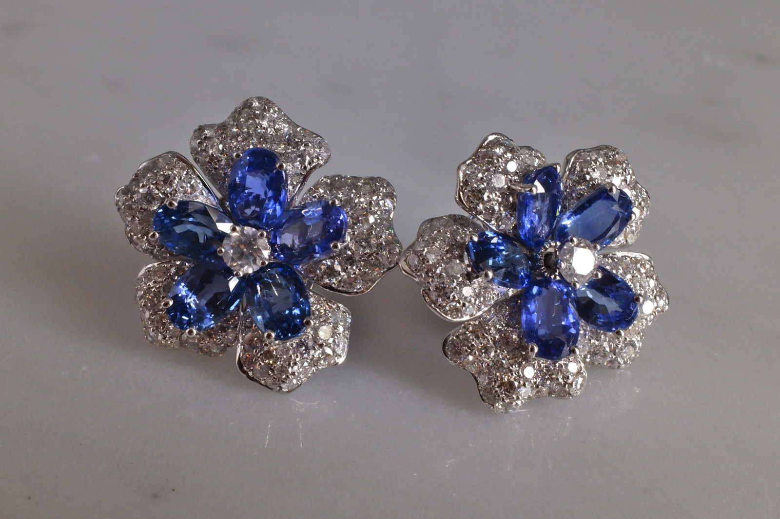 Gem Gardener, blue sapphire flower earrings, big flower earrings studs, sapphire statement earrings, flower earrings singapore, sapphire diamond flower earrings, vintage jewellery singapore, antique jewellery singapore, flower jacket earrings, earring jackets diamond studs