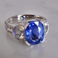 Gem Gardener, cornflower blue sapphire ring, blue sapphire moonstone ring, three stone ring, three stone ring with wedding band, unheated blue sapphire ring, blue sapphire ring singapore