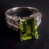 Gem Gardener, platinum peridot ring, peridot engagement ring, peridot ring white gold, peridot ring singapore, fine jewellery singapore, peridot ring with diamonds, burmese peridot ring