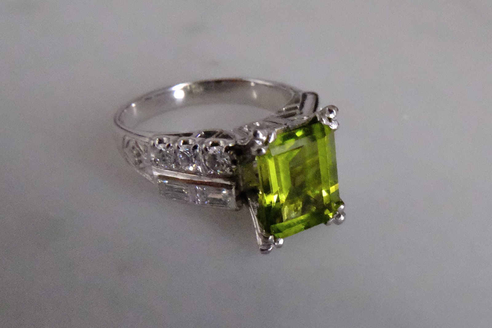 Gem Gardener, platinum peridot ring, peridot engagement ring, peridot ring white gold, peridot ring singapore, fine jewellery singapore, peridot ring with diamonds, burmese peridot ring