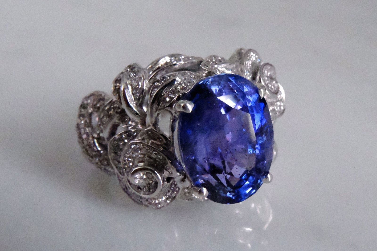 Gem Gardener, flower sapphire ring white gold, sapphire cocktail ring, sapphire flower ring with diamonds, blue sapphire ring singapore, arts and crafts style rings