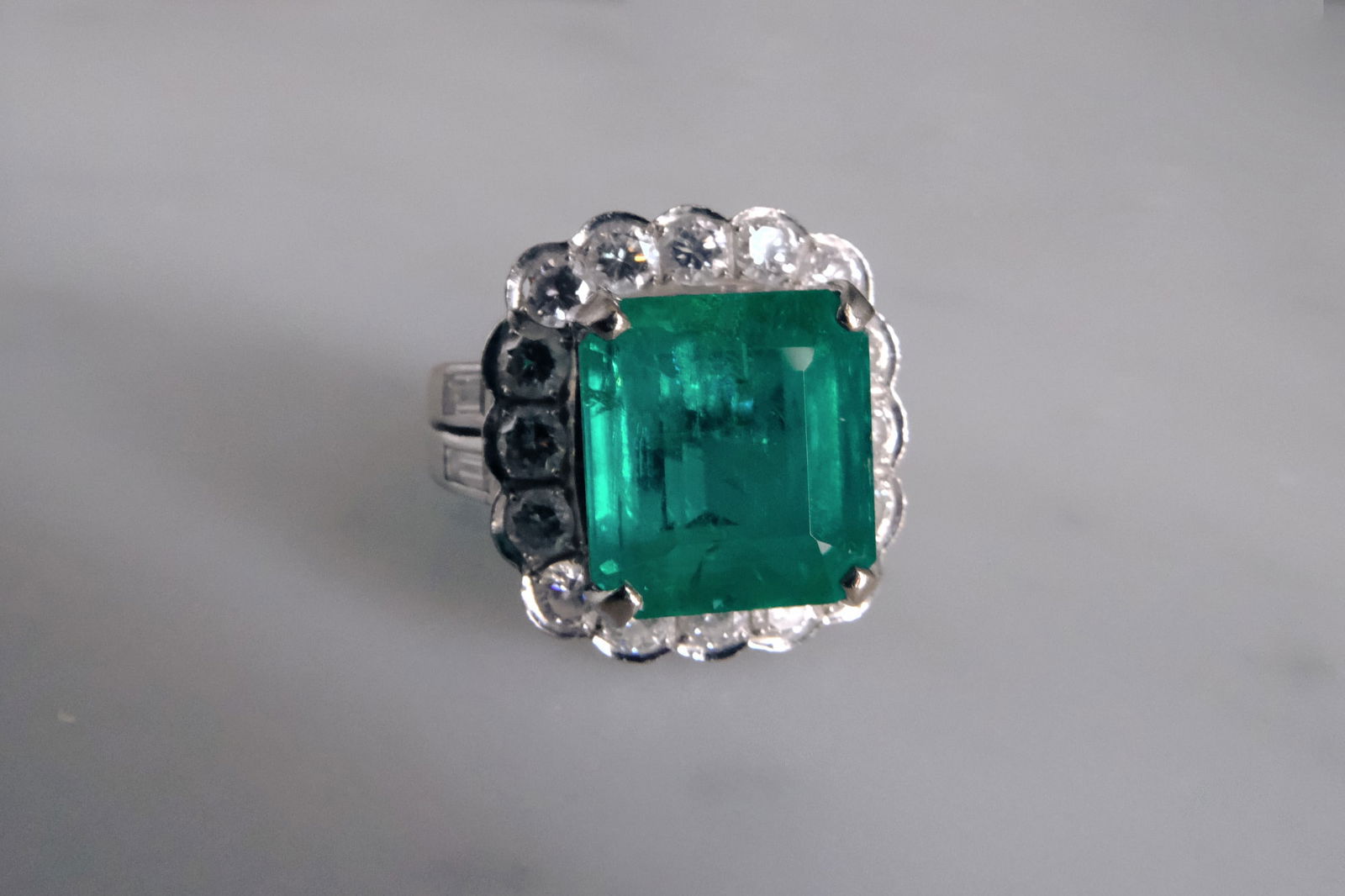 Gem Gardener, emerald halo diamond ring, emerald ring with diamond halo, emerald vivid green, vintage emerald halo ring, antique emerald rings for sale, emerald ring singapore