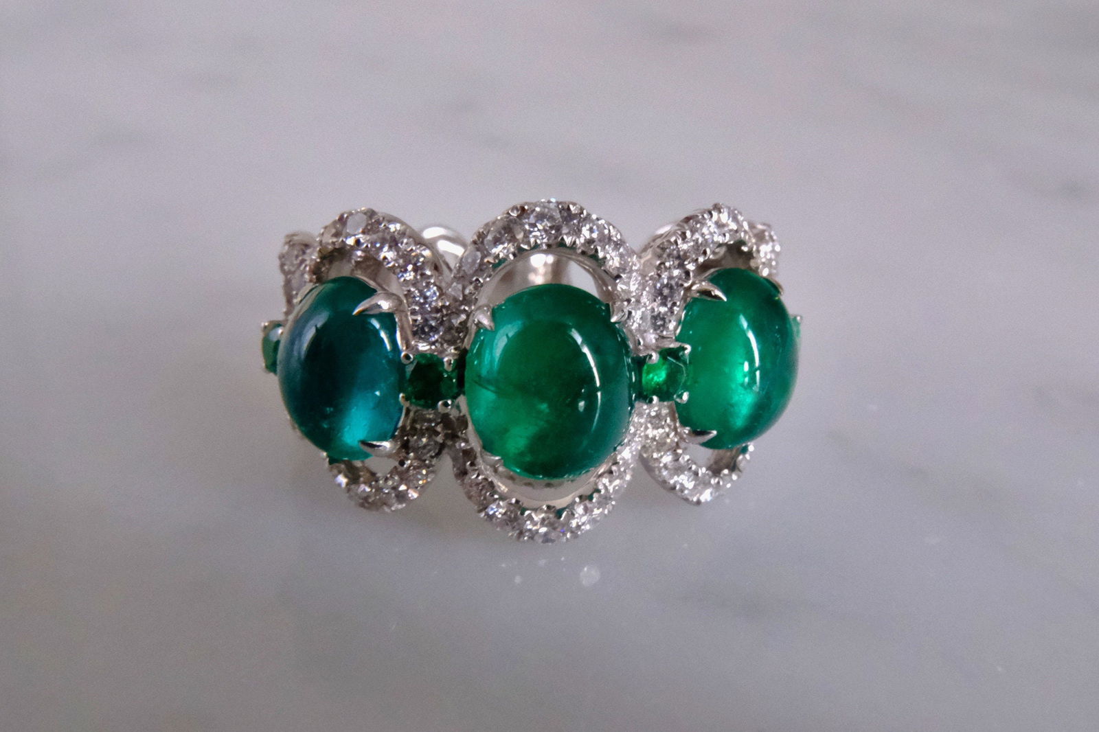 Gem Gardener, emerald three stone ring, three stone ring emerald diamond, wide emerald band ring, emerald cabochon ring, emerald statement ring, emerald ring singapore