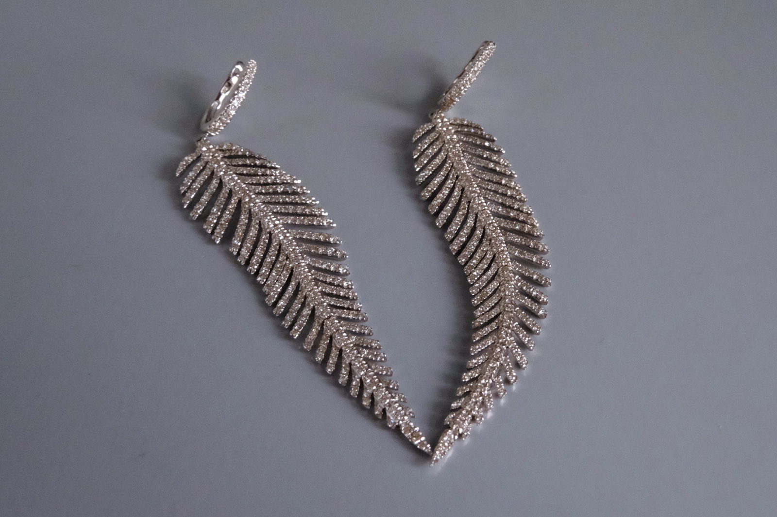 Gem Gardener, Diamond Feather Earrings Long, diamond chandelier earrings, feather diamond dangle earrings, long diamond earrings for sale, diamond dangling earrings singapore, diamond earrings singapore