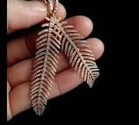 rose gold diamond feather earrings video