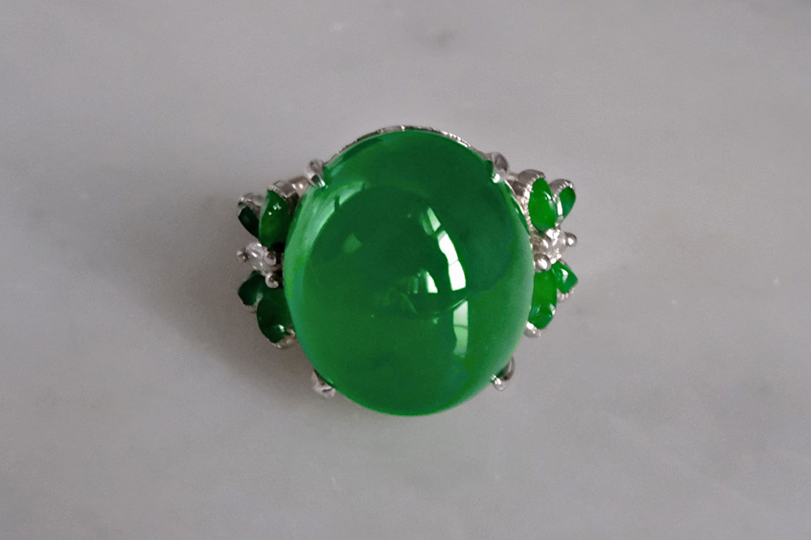 imperial green jadeite ring, imperial green jade price, jadeite ring singapore, imperial jade engagement ring, jade cabochon ring, auction green jade ring, fine jadeite sotheby's, Gem Gardener