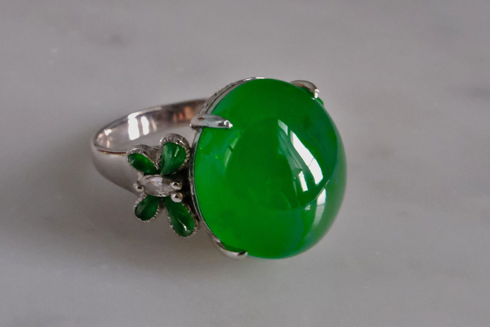 imperial green jadeite ring, imperial green jade price, jadeite ring singapore, imperial jade engagement ring, jade cabochon ring, auction green jade ring, fine jadeite sotheby's, Gem Gardener