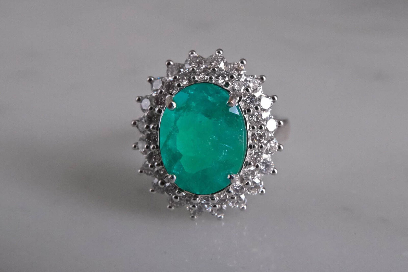 Emerald Ring Halo Diamond, emerald double halo ring, colombian emerald rings for sale, emerald diamond halo ring, emerald ring singapore, buy emerald ring engagement, Gem Gardener