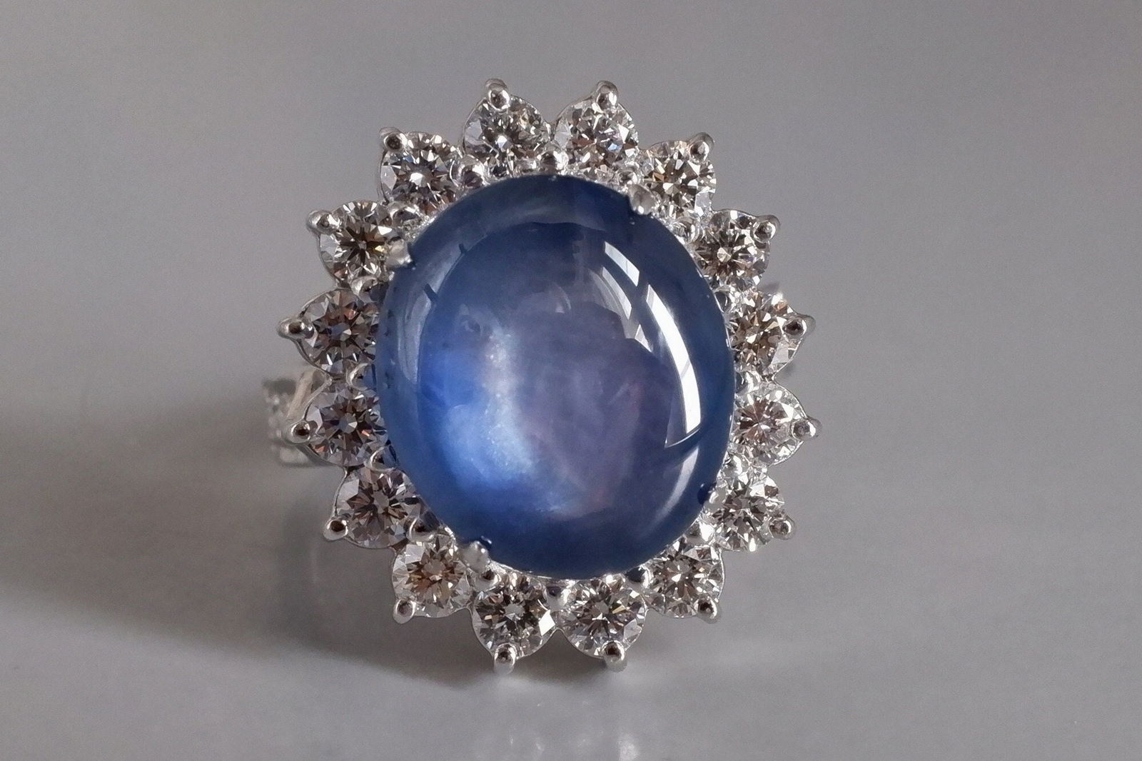 Cabochon Sapphire Ring Blue, blue sapphire cabochon ring, oval sapphire halo diamond ring, blue sapphire ring singapore, sapphire blue cabochon, Gem Gardener