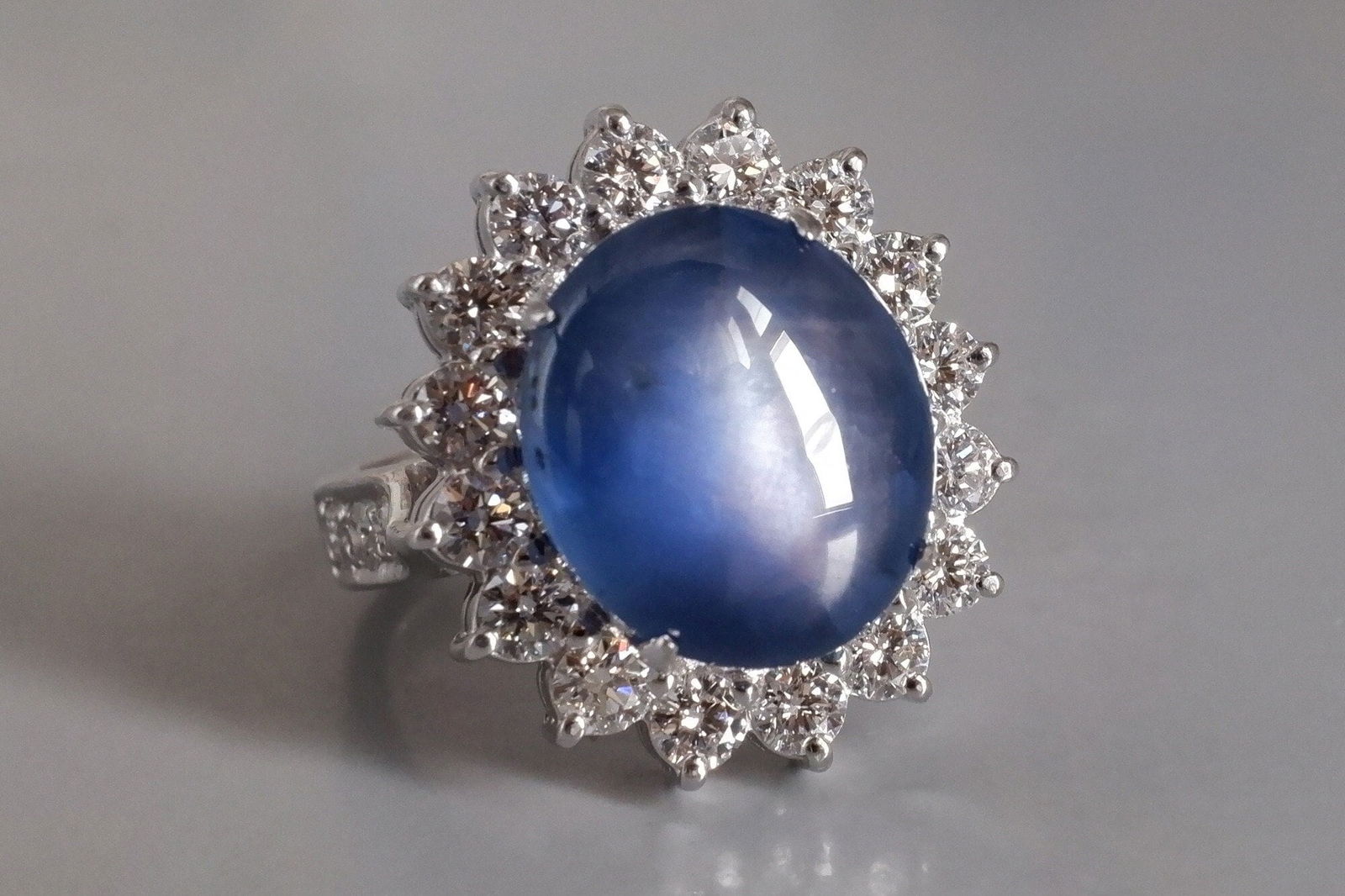Cabochon Sapphire Ring Blue, blue sapphire cabochon ring, oval sapphire halo diamond ring, blue sapphire ring singapore, sapphire blue cabochon, Gem Gardener