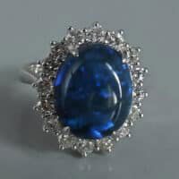 Big Black Opal Ring, black opal ring for sale, australian black opal engagement ring, dark blue opal ring, opal ring singapore, black blue opal engagement ring, large opal ring with diamonds, black opal fine jewelry, Gem Gardener