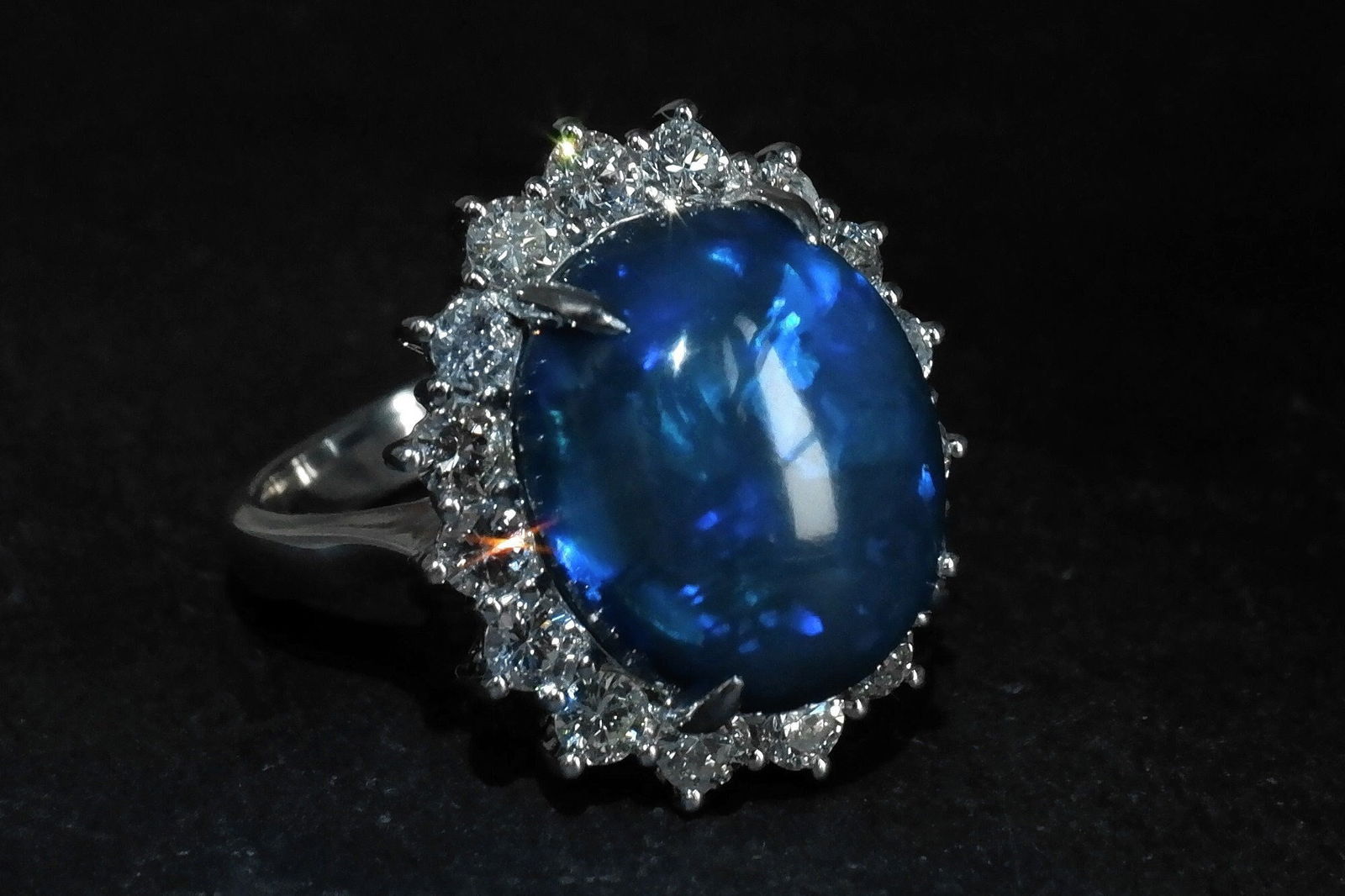 Big Black Opal Ring, black opal ring for sale, australian black opal engagement ring, dark blue opal ring, opal ring singapore, black blue opal engagement ring, large opal ring with diamonds, black opal fine jewelry, Gem Gardener