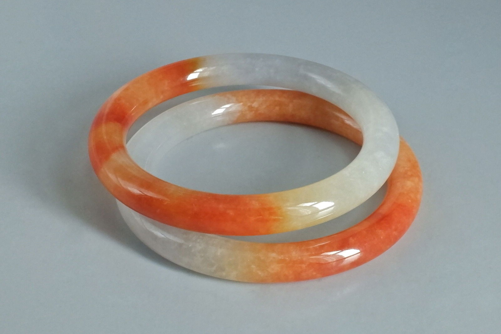 Red Jadeite Bangle, red jade bangle qing, high quality jade bangle, jade bangle singapore, jadeite auction, pair jade bangle, icy jadeite bangle, antique jade bangle, sotheby's jadeite auction, christie's jadeite auction, Gem Gardener