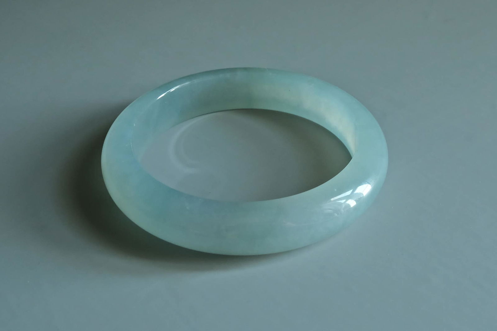 light green jade bangle, icy green jadeite bangle, pale green jade bangle, jade bangle singapore, translucent green jadeite bangle, fine jade jewelry hong kong, Gem Gardener