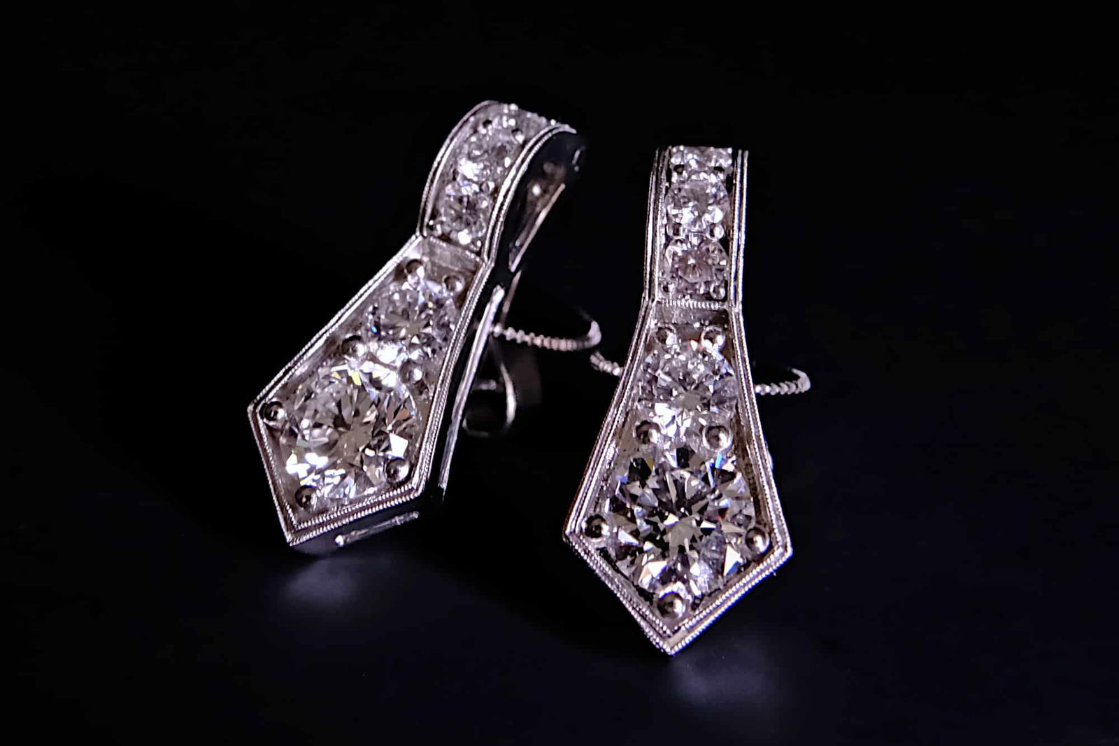 Art Deco diamond earrings, ribbon stud earrings, ribbon diamond earrings, diamond earrings singapore, diamond drop earrings, statement diamond earrings, diamond sword earrings, fine diamond jewellery online shopping, Gem Gardener