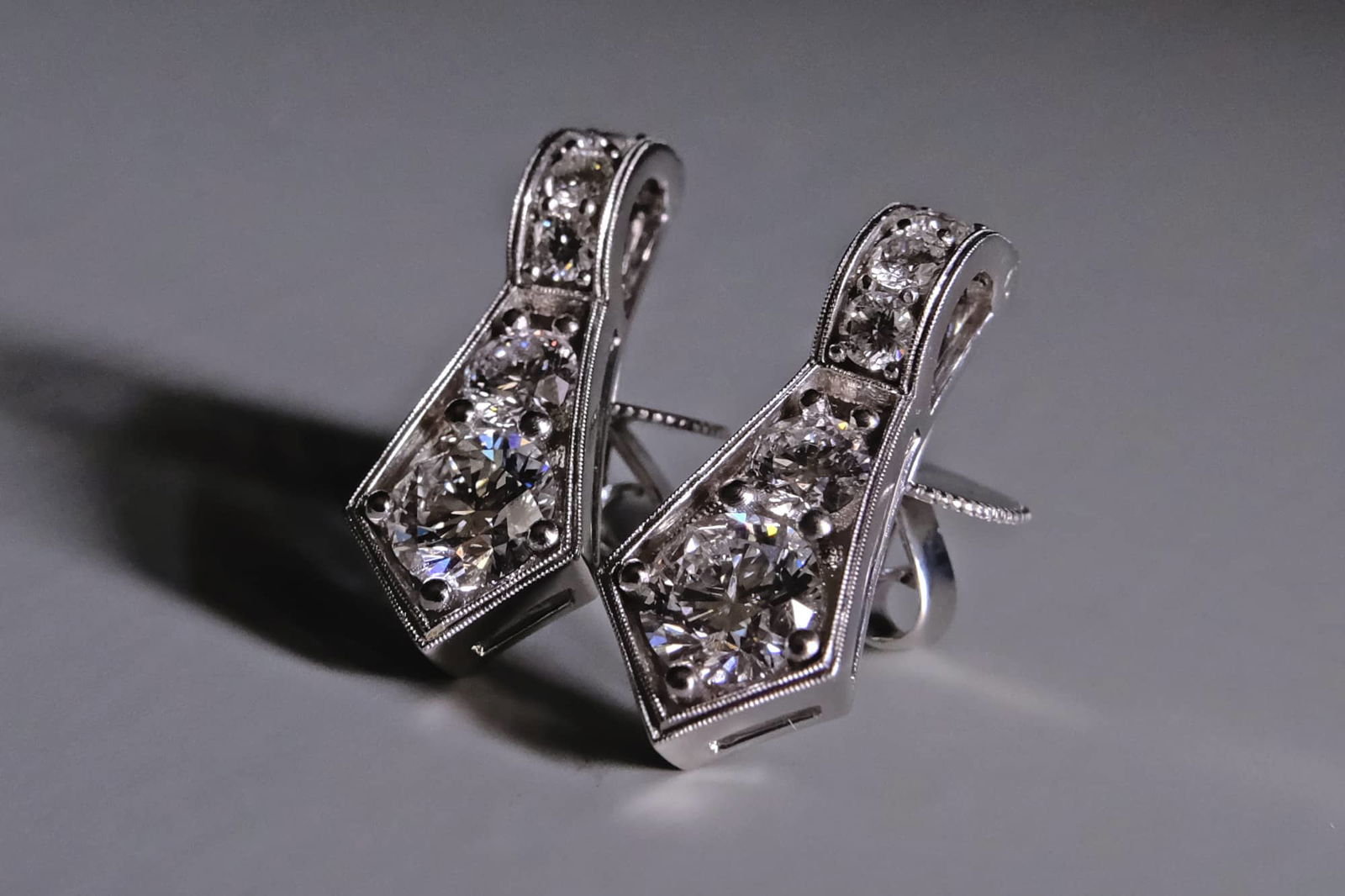Art Deco diamond earrings, ribbon stud earrings, ribbon diamond earrings, diamond earrings singapore, diamond drop earrings, statement diamond earrings, diamond sword earrings, fine diamond jewellery online shopping, Gem Gardener