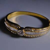 Yellow Gold Diamond Bangle Bracelet, yellow gold diamond bracelet cartier, vintage yellow gold bracelet, classic diamond bangle, antique gold bracelet for women with price, vintage designer jewelry for sale, vintage luxury singapore, vintage diamond jewelry sale, Gem Gardener
