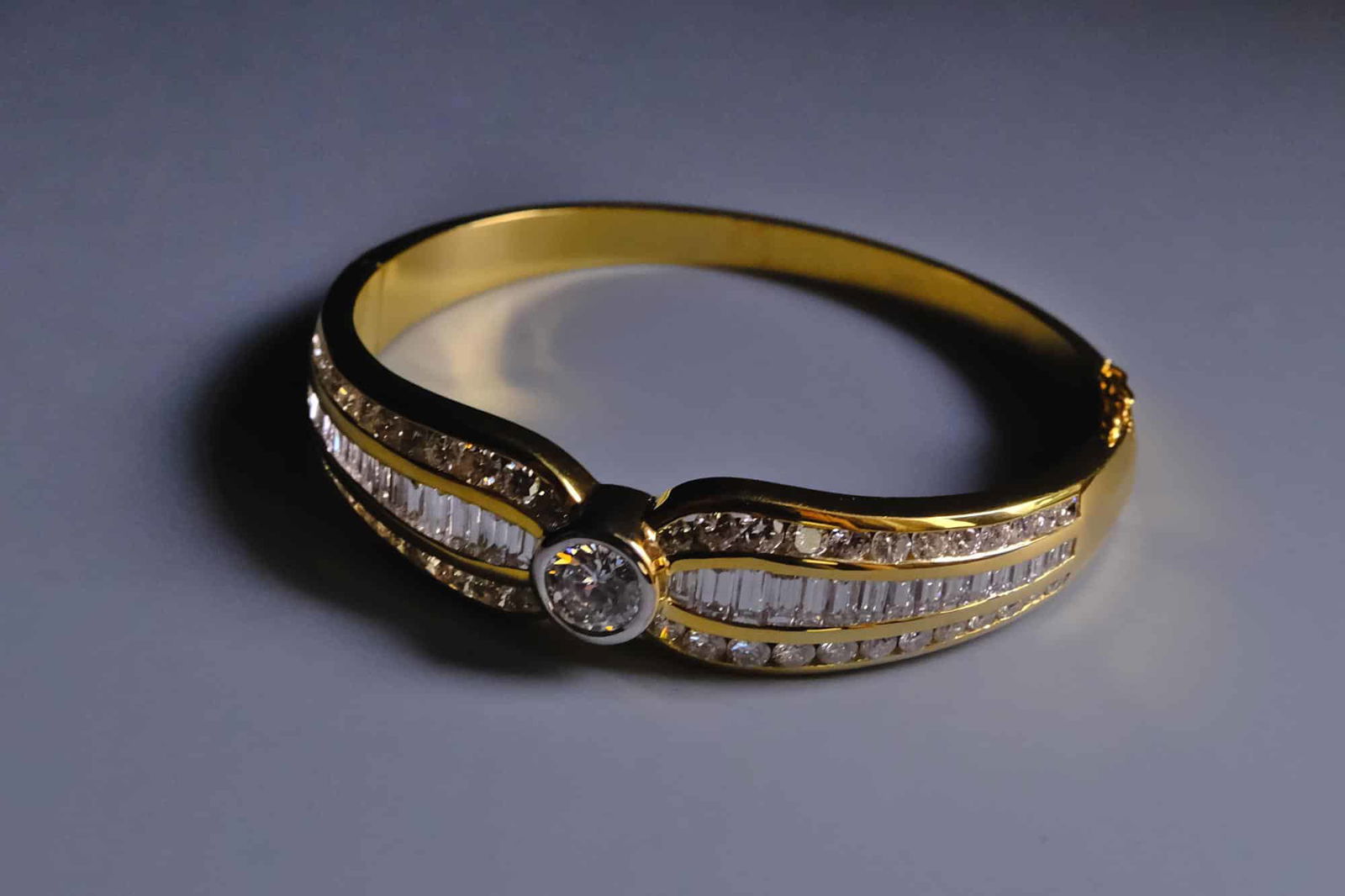 Yellow Gold Diamond Bangle Bracelet, yellow gold diamond bracelet cartier, vintage yellow gold bracelet, classic diamond bangle, antique gold bracelet for women with price, vintage designer jewelry for sale, vintage luxury singapore, vintage diamond jewelry sale, Gem Gardener