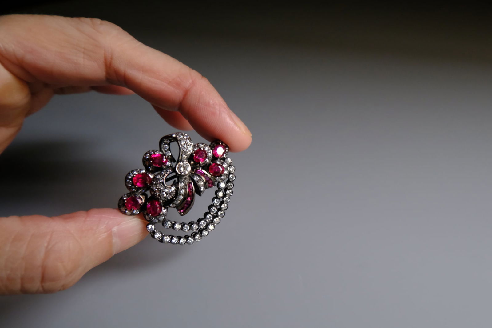 vintage ruby brooch pin, black and gold brooch pin, ruby bow brooch, ruby black gold, brooch pin singapore, antique gold ruby brooch, vintage ruby brooches for sale, fine jewelry brooches, Gem Gardener