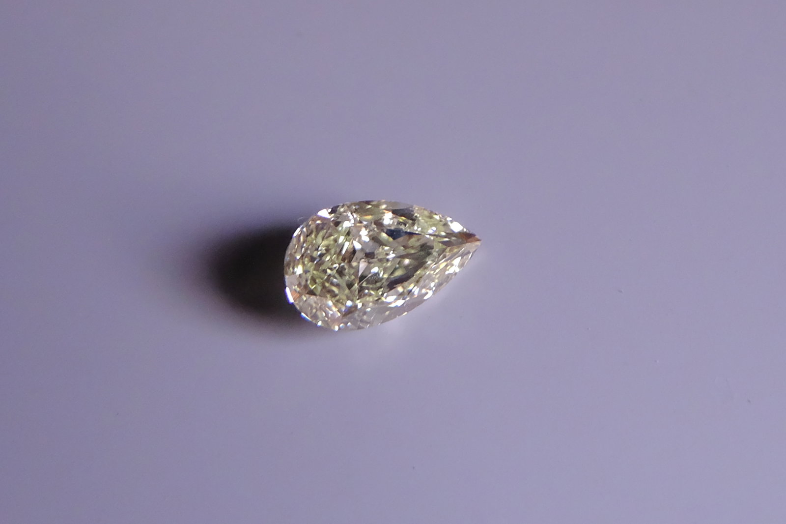 fancy light greenish yellow diamond, fancy light yellow diamond price, fancy light green yellow diamond, light yellow diamond loose, buy loose diamond singapore, coloured diamonds singapore, natural fancy colored diamonds for sale,
