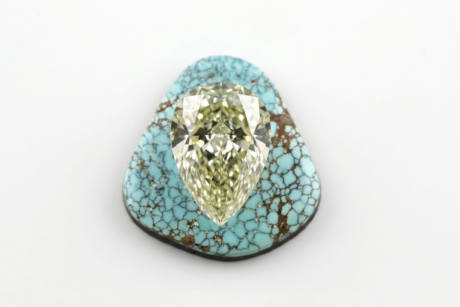 fancy light greenish yellow diamond, fancy light yellow diamond price, fancy light green yellow diamond, fancy yellow pear shaped diamond, light yellow diamond loose, buy loose diamond singapore, coloured diamonds singapore, natural fancy colored diamonds for sale, Gem Gardener