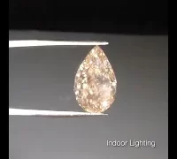 pear cut yellowish orange diamond indoor video