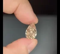pear cut yellowish orange diamond video