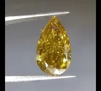 strong yellow fluorescence yellow diamond indoors video